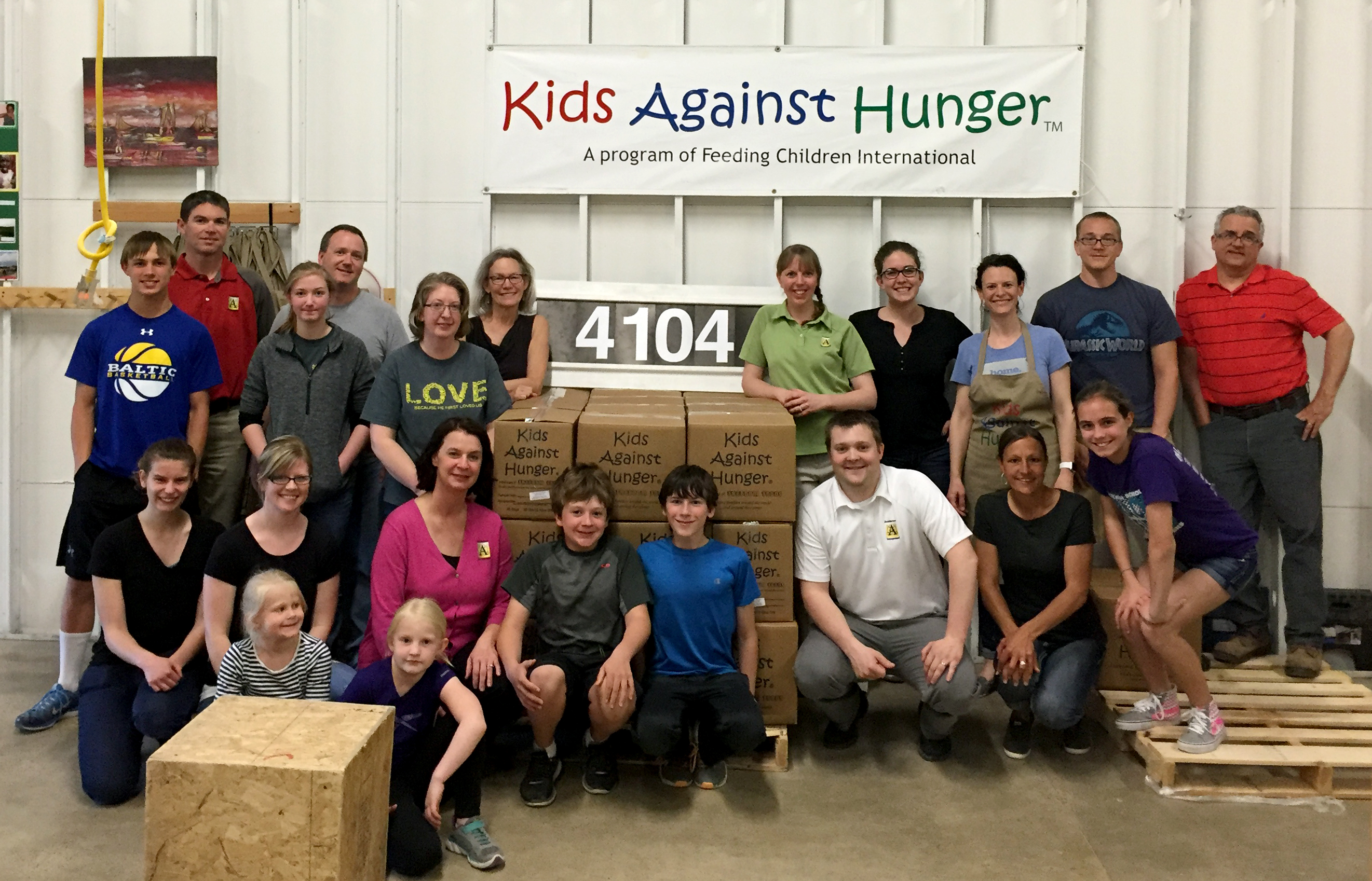 Employees Give Back by Volunteering at Kids Against Hunger
